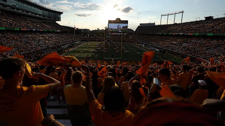 Aug 28, 2025; Minneapolis, Minnesota, USA; Minnesota Golden Gophers fans wave towels before the game against the Buffalo Bulls at Huntington Bank Stadium. Mandatory Credit: Matt Krohn-Imagn Images