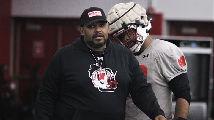 Defensive line coach E.J. Whitlow goes through spring practice at the McClain Center in Madison, Wisconsin on Tuesday April 2, 2024.