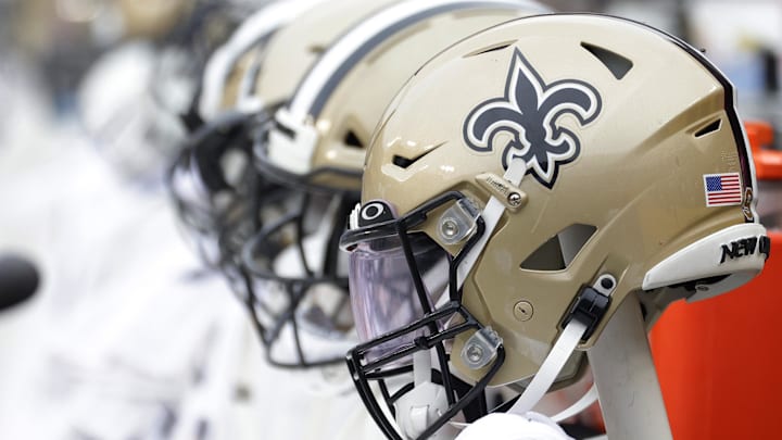 Oct 10, 2021; Landover, Maryland, USA; New Orleans Saints players' helmets on the bench against the Washington Football Team at FedExField. Mandatory Credit: Geoff Burke-Imagn Images Oct 10, 2021; Landover, Maryland, USA; New Orleans Saints players' helmets on the bench against the Washington Football Team at FedExField. Mandatory Credit: Geoff Burke-Imagn Images