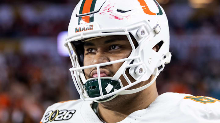 Jan 19, 2026; Miami Gardens, FL, USA; Miami Hurricanes offensive lineman Francis Mauigoa (61) against the Indiana Hoosiers during the College Football Playoff National Championship game at Hard Rock Stadium. Mandatory Credit: Mark J. Rebilas-Imagn Images Jan 19, 2026; Miami Gardens, FL, USA; Miami Hurricanes offensive lineman Francis Mauigoa (61) against the Indiana Hoosiers during the College Football Playoff National Championship game at Hard Rock Stadium. Mandatory Credit: Mark J. Rebilas-Imagn Images