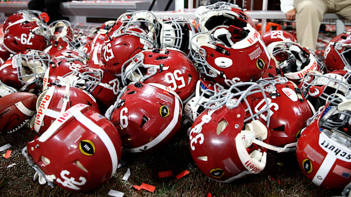 Jan 8, 2018; Atlanta, GA, USA; Detailed view of Alabama Crimson Tide player helmets on the ground after defeating the Georgia Bulldogs in the 2018 CFP national championship college football game at Mercedes-Benz Stadium.