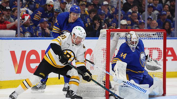 Apr 28, 2026; Buffalo, New York, USA; Buffalo Sabres defenseman Logan Stanley (64) defends as Boston Bruins center Michael Eyssimont (81) takes a shot on Buffalo Sabres goaltender Alex Lyon (34) during the third period in game five of the first round of the 2026 Stanley Cup Playoffs at KeyBank Center. Mandatory Credit: Timothy T. Ludwig-Imagn Images Apr 28, 2026; Buffalo, New York, USA; Buffalo Sabres defenseman Logan Stanley (64) defends as Boston Bruins center Michael Eyssimont (81) takes a shot on Buffalo Sabres goaltender Alex Lyon (34) during the third period in game five of the first round of the 2026 Stanley Cup Playoffs at KeyBank Center. Mandatory Credit: Timothy T. Ludwig-Imagn Images