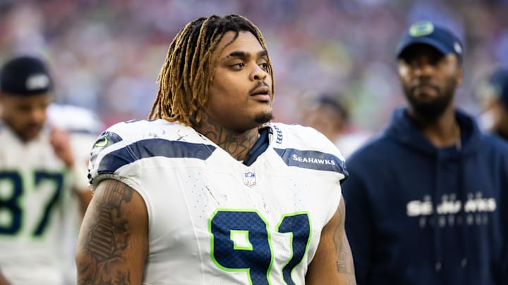 Dec 8, 2024; Glendale, Arizona, USA; Seattle Seahawks defensive tackle Byron Murphy II (91) against the Arizona Cardinals at State Farm Stadium. Mandatory Credit: Mark J. Rebilas-Imagn Images