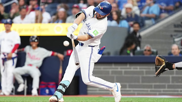 Toronto Blue Jays designated hitter Spencer Horwitz (48) hits a double against the Philadelphia Phillies during the first inning at Rogers Centre. 