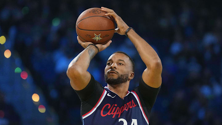 Feb 15, 2025; San Francisco, CA, USA; LA Clippers guard Norman Powell (24) competes in the three-point contest during All Star Saturday Night ahead of the 2025 NBA All Star Game at Chase Center. Mandatory Credit: Kyle Terada-Imagn Images Feb 15, 2025; San Francisco, CA, USA; LA Clippers guard Norman Powell (24) competes in the three-point contest during All Star Saturday Night ahead of the 2025 NBA All Star Game at Chase Center. Mandatory Credit: Kyle Terada-Imagn Images