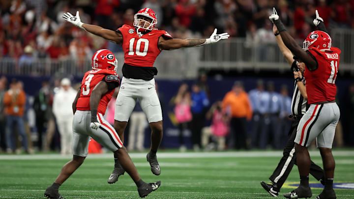 Dec 7, 2024; Atlanta, GA, USA; Georgia Bulldogs linebacker Damon Wilson II (10), linebacker Jalon Walker (11) and linebacker CJ Allen (3) react during the second half in the 2024 SEC Championship game at Mercedes-Benz Stadium. Mandatory Credit: Brett Davis-Imagn Images