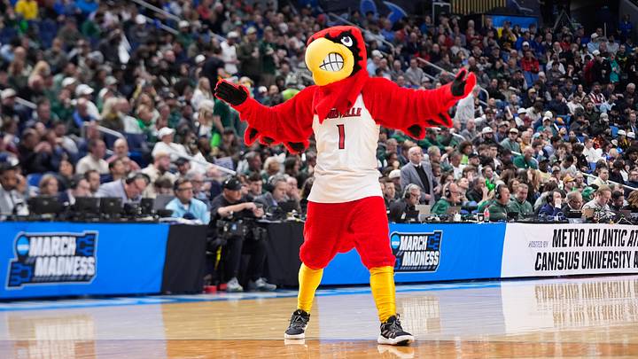 Mar 19, 2026; Buffalo, NY, USA; The Louisville Cardinals mascot performs during the second half against the South Florida Bulls during a first round game of the men's 2026 NCAA Tournament at Keybank Center. Mandatory Credit: Gregory Fisher-Imagn Images
