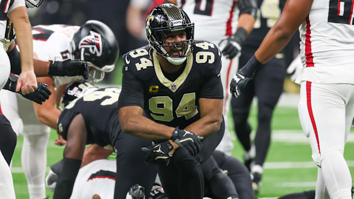 Nov 23, 2025; New Orleans, Louisiana, USA; New Orleans Saints defensive end Cameron Jordan (94) reacts after forcing a fumble against the Atlanta Falcons during the first half at Caesars Superdome. Mandatory Credit: Stephen Lew-Imagn Images