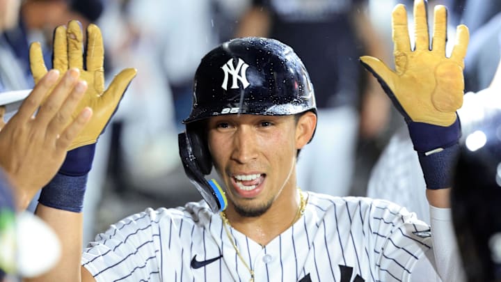 Mar 6, 2026; Tampa, Florida, USA; New York Yankees infielder Oswaldo Cabrera (95)  is congratulated after scoring a run during the second inning against the Tampa Bay Rays at George M. Steinbrenner Field. Mandatory Credit: Kim Klement Neitzel-Imagn Images