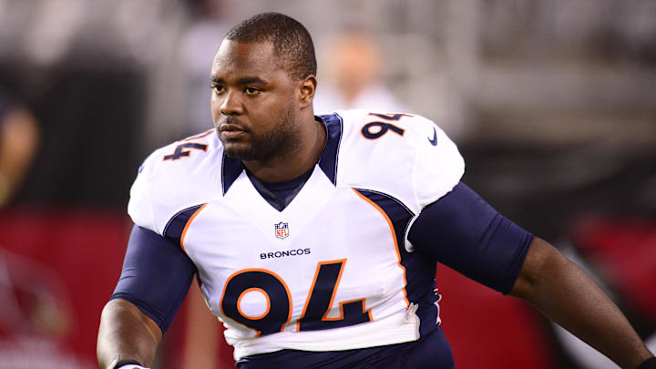 Denver Broncos defensive tackle Ty Warren against the Arizona Cardinals during a preseason game at University of Phoenix Stadium.