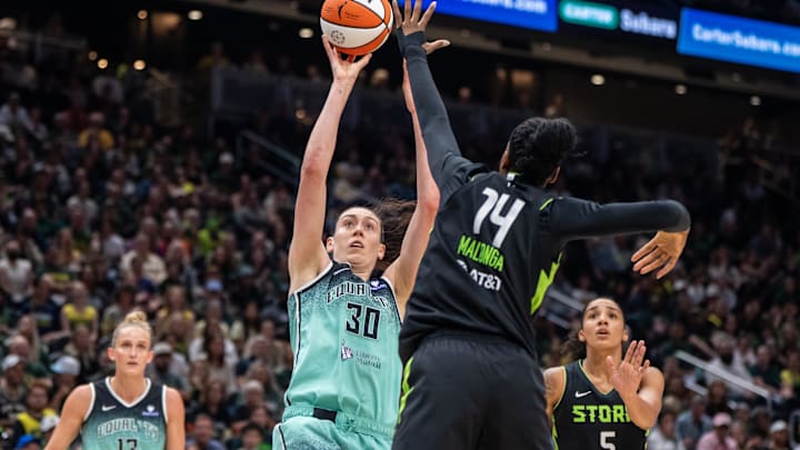 Sep 5, 2025; Seattle, Washington, USA; New York Liberty forward Breanna Stewart (30) shoots the ball against Seattle Storm center Dominique Malonga (14) during the first half at Climate Pledge Arena. Mandatory Credit: Stephen Brashear-Imagn Images Sep 5, 2025; Seattle, Washington, USA; New York Liberty forward Breanna Stewart (30) shoots the ball against Seattle Storm center Dominique Malonga (14) during the first half at Climate Pledge Arena. Mandatory Credit: Stephen Brashear-Imagn Images