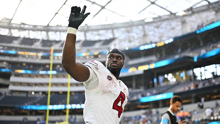Sep 13, 2026; Inglewood, California, USA;  Arizona Cardinals running back Jeremiyah Love (4) gestures to fans as he leaves the field after defeating the Los Angeles Chargers at SoFi Stadium.  Mandatory Credit: William Liang-Imagn Images