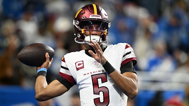Washington Commanders quarterback Jayden Daniels (5) warms up prior to the game against Detroit Lions in a 2025 NFC divisional round game at Ford Field. 