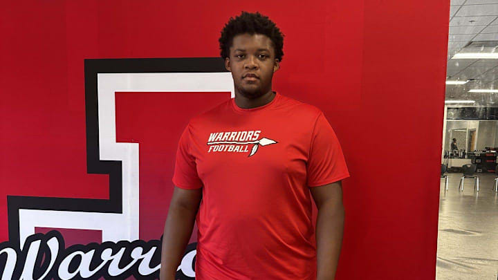 Cam'Ron Thompson, a junior offensive lineman on the Jenkins football team in the Warrior weight room.