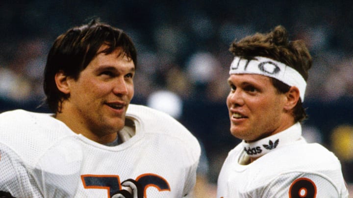 Jan 26, 1986; New Orleans, LA, USA; FILE PHOTO; Chicago Bears quarterback (9) Jim McMahon and defensive tackle (76) Steve McMichael celebrate as they defeated the New England Patriots in Super Bowl XX at the Superdome 46-10. Mandatory Credit: Photo By Malcolm Emmons- Imagn Images © Copyright Malcolm Emmons Jan 26, 1986; New Orleans, LA, USA; FILE PHOTO; Chicago Bears quarterback (9) Jim McMahon and defensive tackle (76) Steve McMichael celebrate as they defeated the New England Patriots in Super Bowl XX at the Superdome 46-10. Mandatory Credit: Photo By Malcolm Emmons- Imagn Images © Copyright Malcolm Emmons
