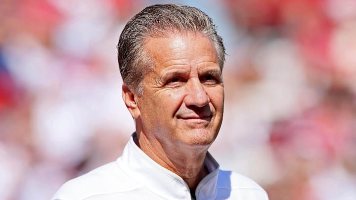 Sep 27, 2025; Fayetteville, Arkansas, USA; Arkansas Razorbacks men’s basketball head coach John Calipari is introduced during a timeout in the first quarter against the Notre Dame Fighting Irish at Donald W. Reynolds Razorback Stadium. Mandatory Credit: Nelson Chenault-Imagn Images