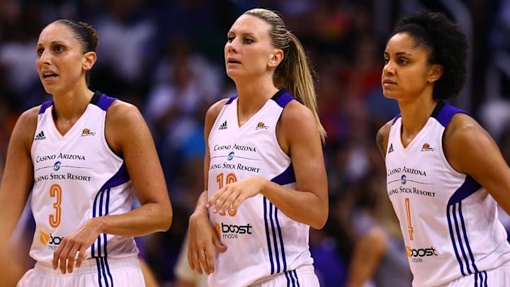 Sep 9, 2014; Phoenix, AZ, USA; Phoenix Mercury guard Diana Taurasi (3), forward Penny Taylor (13) and forward Candice Dupree (4) against the Chicago Sky during game two of the WNBA Finals at US Airways Center. The Mercury defeated the Sky 97-68. Mandatory Credit: Mark J. Rebilas-Imagn Images