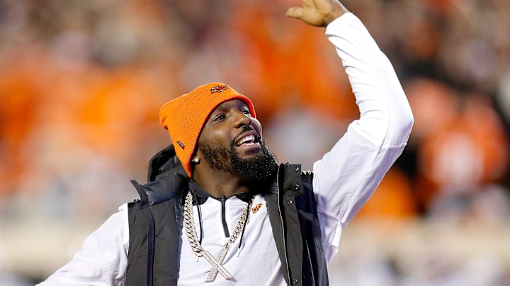 Dez Bryant pumps up the crowd during a Bedlam college football game.