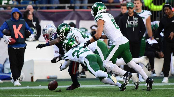Oct 18, 2026; Foxborough, Massachusetts, USA; New England Patriots wide receiver DeMario Douglas (3) fumbles the ball after being tackled by New York Jets linebacker Jamien Sherwood (44) during the second half at Gillette Stadium. Mandatory Credit: Bob DeChiara-Imagn Images Oct 18, 2026; Foxborough, Massachusetts, USA; New England Patriots wide receiver DeMario Douglas (3) fumbles the ball after being tackled by New York Jets linebacker Jamien Sherwood (44) during the second half at Gillette Stadium. Mandatory Credit: Bob DeChiara-Imagn Images