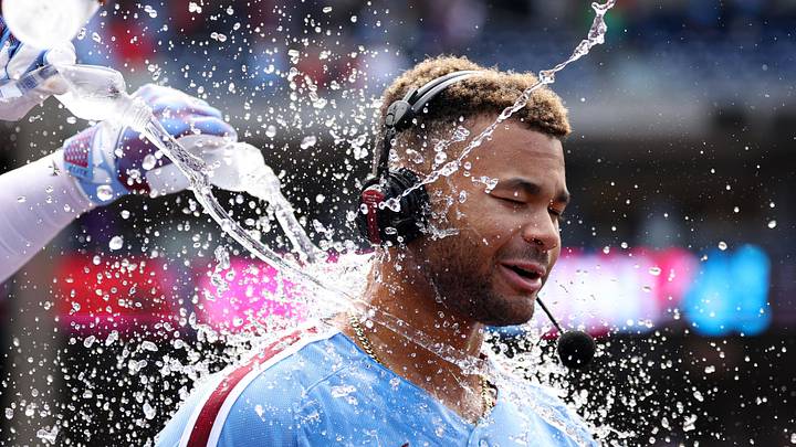 Apr 30, 2026; Philadelphia, Pennsylvania, USA; Philadelphia Phillies center fielder Justin Crawford (2) is doused by water after hitting a walk off RBI single during the ninth inning against the San Francisco Giants at Citizens Bank Park. Mandatory Credit: Bill Streicher-Imagn Images