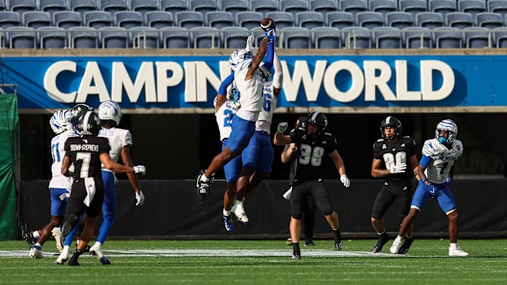 Oct 12, 2024; Orlando, Florida, USA; Memphis Tigers defensive back Kobee Minor breaks up a Hail Mary pass against the South Florida Bulls in the second quarter at Camping World Stadium. Mandatory Credit: Nathan Ray Seebeck-Imagn Images