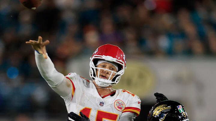 Kansas City Chiefs quarterback Patrick Mahomes (15) is pressured by Jacksonville Jaguars defensive end Emmanuel Ogbah (90) during the fourth quarter of an NFL football matchup at EverBank Stadium, Monday, Oct. 6, 2025, in Jacksonville, Fla. The Jacksonville Jaguars edged the Kansas City Chiefs 31-28. [Corey Perrine/Florida Times-Union]
