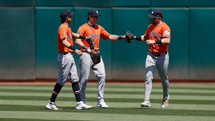 Houston Astros outfielder Chas McCormick, Mauricio Dubón, Jake Meyers