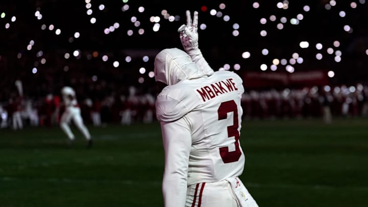 Alabama's Jaylen Mbakwe (3) signals after praying in the end zone before the College Football Playoff game between the University of Oklahoma Sooners (OU) and the Alabama Crimson Tide at the Gaylord Family - Oklahoma Memorial Stadium in Norman, Okla., Friday Dec. 19, 2025.