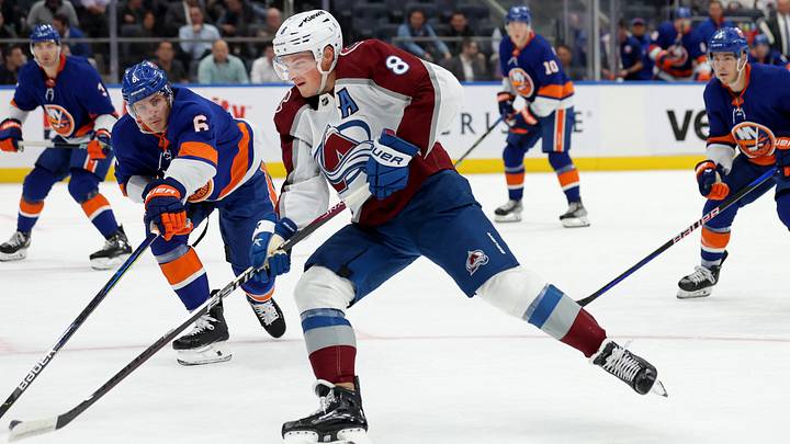 Oct 24, 2023; Elmont, New York, USA; Colorado Avalanche defenseman Cale Makar (8) shoots and scores on a backhanded shot against New York Islanders defenseman Ryan Pulock (6) during the first period at UBS Arena. Mandatory Credit: Brad Penner-USA TODAY Sports Oct 24, 2023; Elmont, New York, USA; Colorado Avalanche defenseman Cale Makar (8) shoots and scores on a backhanded shot against New York Islanders defenseman Ryan Pulock (6) during the first period at UBS Arena. Mandatory Credit: Brad Penner-USA TODAY Sports