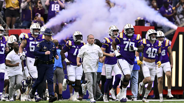 Dec 31, 2024; Houston, TX, USA; LSU Tigers head coach Brian Kelly enters the field with the team prior to the game against the Baylor Bears at NRG Stadium. Mandatory Credit: Maria Lysaker-Imagn Images Dec 31, 2024; Houston, TX, USA; LSU Tigers head coach Brian Kelly enters the field with the team prior to the game against the Baylor Bears at NRG Stadium. Mandatory Credit: Maria Lysaker-Imagn Images