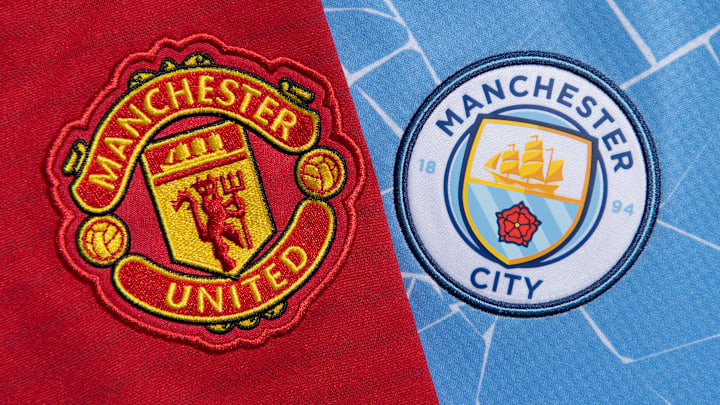 The Manchester United and Manchester City Club Badges