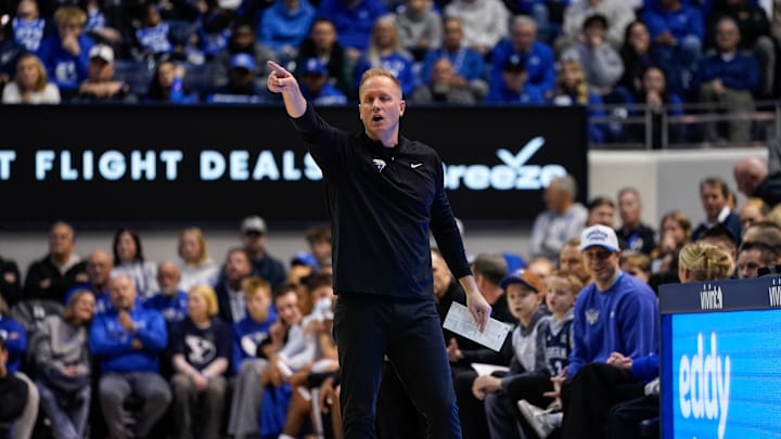 Jan 24, 2026; Provo, Utah, USA; BYU Cougars head coach Kevin Young reatcs during the first half against the Utah Utes at Marriott Center. Mandatory Credit: Aaron Baker-Imagn Images Jan 24, 2026; Provo, Utah, USA; BYU Cougars head coach Kevin Young reatcs during the first half against the Utah Utes at Marriott Center. Mandatory Credit: Aaron Baker-Imagn Images