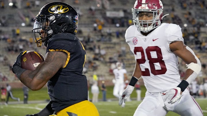 Sep 26, 2020; Columbia, Missouri, USA; Missouri Tigers running back Tyler Badie (1) runs for a touchdown against Alabama Crimson Tide defensive back Josh Jobe (28) during the second half at Faurot Field at Memorial Stadium. Mandatory Credit: Denny Medley-Imagn Images Sep 26, 2020; Columbia, Missouri, USA; Missouri Tigers running back Tyler Badie (1) runs for a touchdown against Alabama Crimson Tide defensive back Josh Jobe (28) during the second half at Faurot Field at Memorial Stadium. Mandatory Credit: Denny Medley-Imagn Images