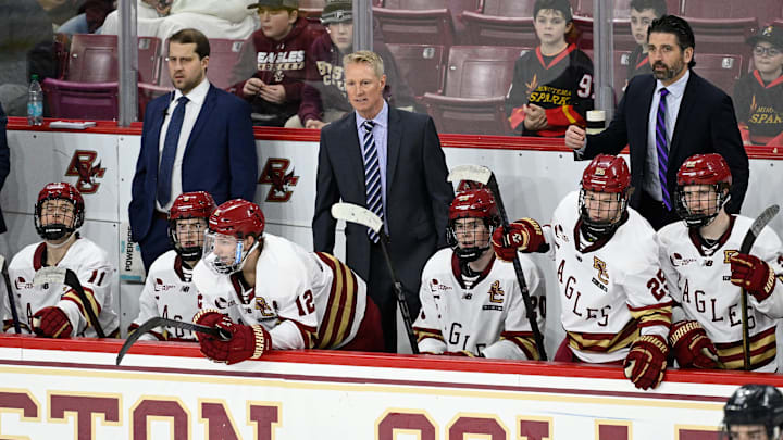 Feb 28, 2025; Chestnut Hill, MA, USA; Boston College Eagles head coach Greg Brown (center) looks on during the third period against the University of New Hampshire Wildcats at Conte Forum. Mandatory Credit: Eric Canha-Imagn Images Feb 28, 2025; Chestnut Hill, MA, USA; Boston College Eagles head coach Greg Brown (center) looks on during the third period against the University of New Hampshire Wildcats at Conte Forum. Mandatory Credit: Eric Canha-Imagn Images