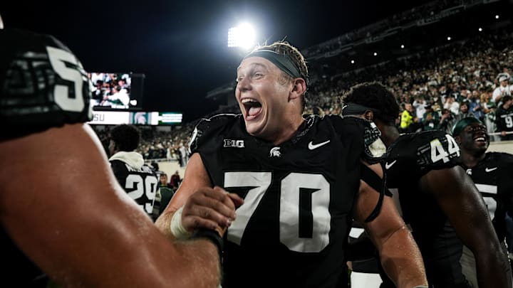 Sep 6, 2025; East Lansing, Michigan, USA; Michigan State offensive lineman Luka Vincic (70) celebrates a double-overtime victory over Boston College at Spartan Stadium. Mandatory Credit: Brendan Mullin-Imagn Images