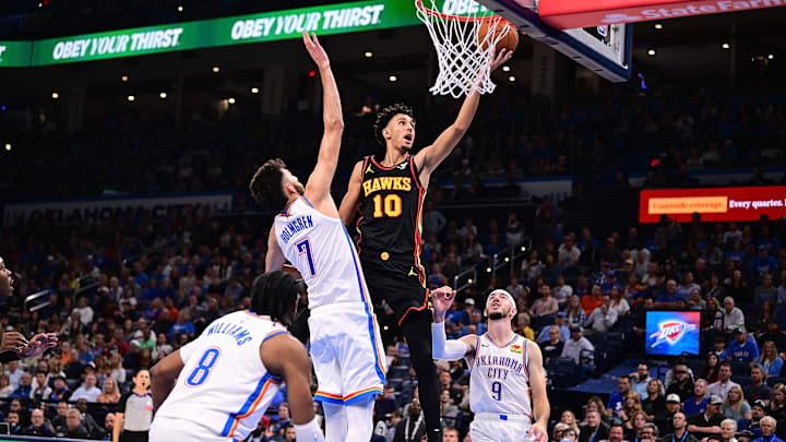 Zaccharie Risacher #10 of the Atlanta Hawks rises for a layup.