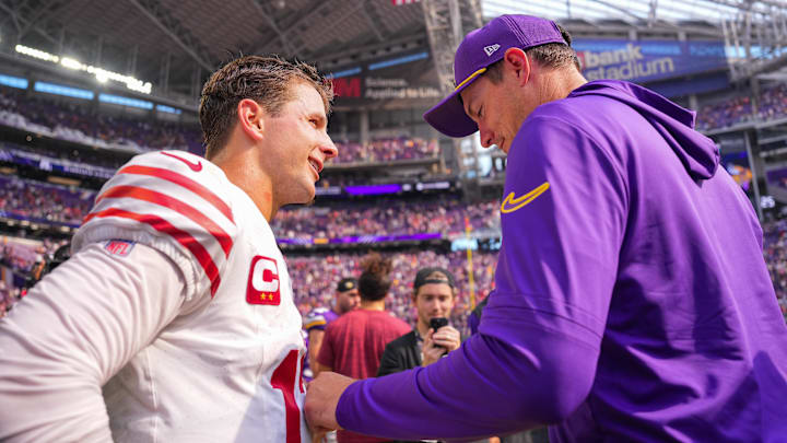Sep 15, 2024; Minneapolis, Minnesota, USA; San Francisco 49ers quarterback Brock Purdy (13) and Minnesota Vikings head coach Kevin O'Connell talk after the game at U.S. Bank Stadium. Mandatory Credit: Brad Rempel-Imagn Images Sep 15, 2024; Minneapolis, Minnesota, USA; San Francisco 49ers quarterback Brock Purdy (13) and Minnesota Vikings head coach Kevin O'Connell talk after the game at U.S. Bank Stadium. Mandatory Credit: Brad Rempel-Imagn Images