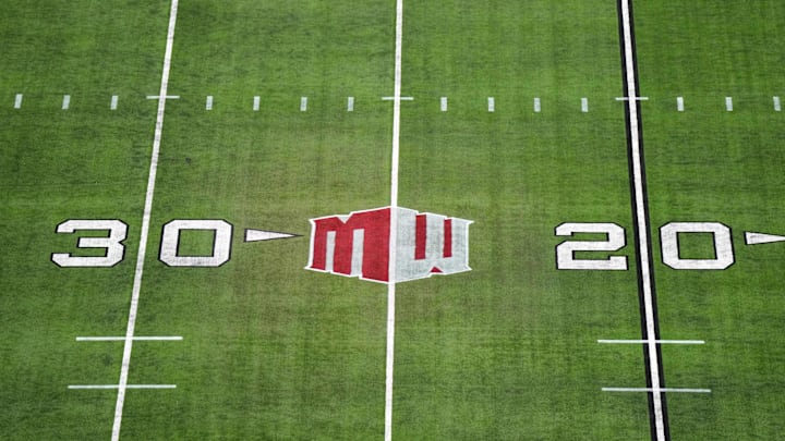 The Mountain West conference logo on the field at Allegiant Stadium. Mandatory Credit: Kirby Lee-Imagn Images