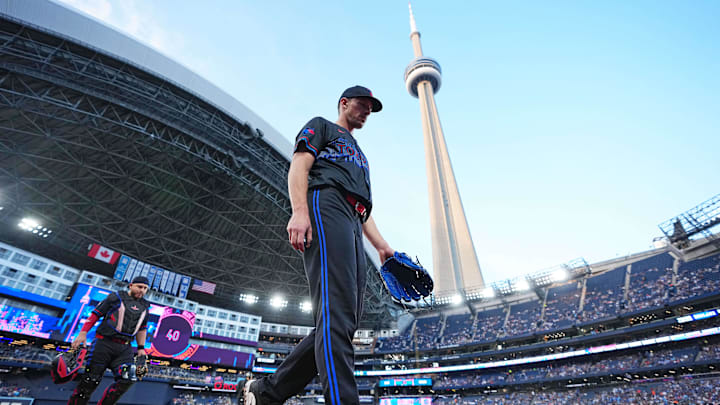 Sep 12, 2025; Toronto, Ontario, CAN; Toronto Blue Jays starting pitcher Chris Bassitt (40) walks towards the dugout before the start of game against the Baltimore Orioles during the first inning at Rogers Centre. 