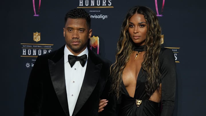 Russell Wilson and his wife Ciara appear on the red carpet before the NFL Honors awards presentation at YouTube Theater.
