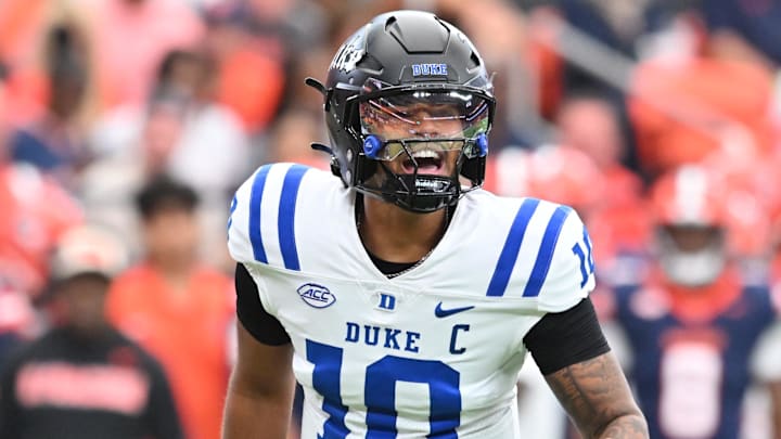 Sep 27, 2025; Syracuse, New York, USA; Duke Blue Devils quarterback Darian Mensah (10) calls a play in the first quarter against the Syracuse Orange at the JMA Wireless Dome. Mandatory Credit: Mark Konezny-Imagn Images