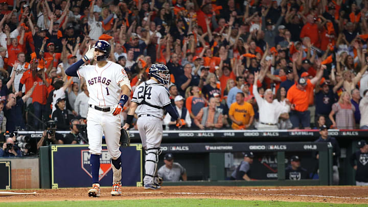 Oct 13, 2019; Houston, TX, USA; Houston Astros shortstop Carlos Correa (1) celebrates after hitting a walk off solo home run off of New York Yankees starting pitcher J.A. Happ (not pictured) during the eleventh inning in game two of the 2019 ALCS playoff baseball series at Minute Maid Park. 