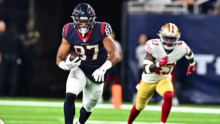 Aug 25, 2022; Houston, Texas, USA;  Houston Texans tight end Seth Green (87) runs the ball during the second half against the San Francisco 49ers at NRG Stadium.