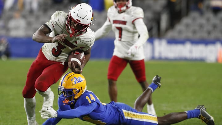 Oct 14, 2023; Pittsburgh, Pennsylvania, USA; Louisville Cardinals wide receiver Kevin Coleman (3) runs after a catch against Pittsburgh Panthers defensive back Marquis Williams (14) during the fourth quarter at Acrisure Stadium. Pittsburgh won 38-21.