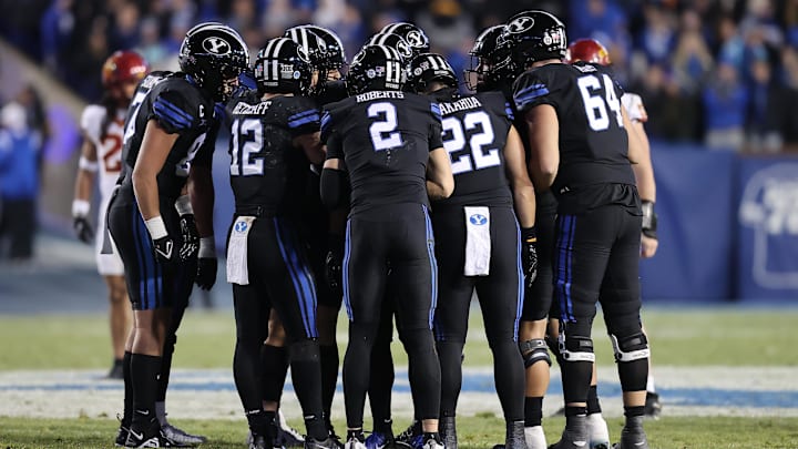 Nov 11, 2023; Provo, Utah, USA; The Brigham Young Cougars huddle up before a play against the Iowa State Cyclones in the second half at LaVell Edwards Stadium. Mandatory Credit: Rob Gray-Imagn Images