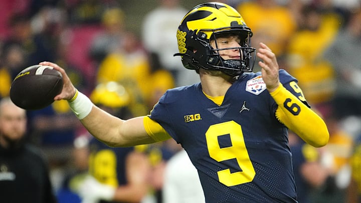 Michigan quarterback JJ McCarthy (9) throws a pass