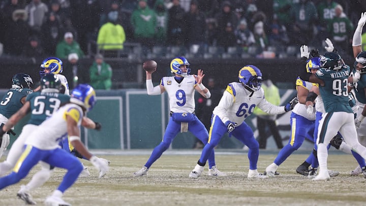 Jan 19, 2025; Philadelphia, Pennsylvania, USA; Los Angeles Rams quarterback Matthew Stafford (9) throws the ball in the second half against the Philadelphia Eagles in a 2025 NFC divisional round game at Lincoln Financial Field. Mandatory Credit: Bill Streicher-Imagn Images