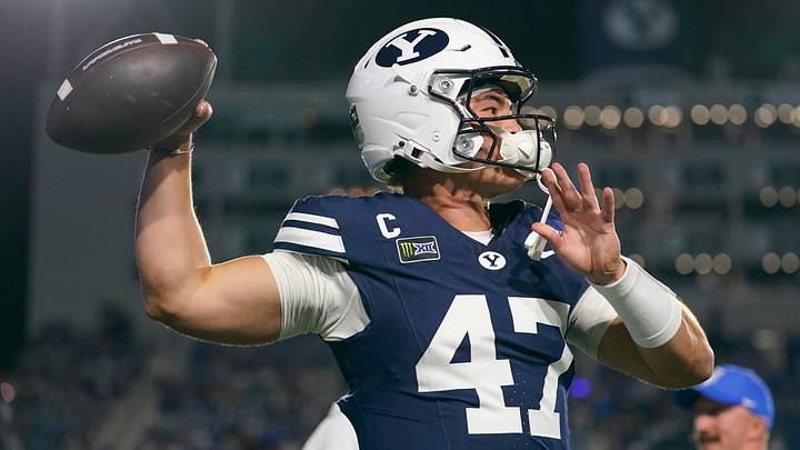 BYU quarterback Bear Bachmeier (47) warms up prior to a game against the Iowa State Cyclones BYU quarterback Bear Bachmeier (47) warms up prior to a game against the Iowa State Cyclones