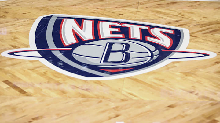 Nov 17, 2021; Brooklyn, New York, USA; The old Nets logo on the court prior to the game between the Cleveland Cavilers and the Brooklyn Nets at Barclays Center. Mandatory Credit: Wendell Cruz-Imagn Images Nov 17, 2021; Brooklyn, New York, USA; The old Nets logo on the court prior to the game between the Cleveland Cavilers and the Brooklyn Nets at Barclays Center. Mandatory Credit: Wendell Cruz-Imagn Images