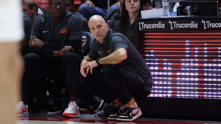 Jan 31, 2026; Salt Lake City, Utah, USA; Oklahoma State Cowboys head coach Steve Lutz watches play during the second half of the game against the Utah Utes at Jon M. Huntsman Center. Mandatory Credit: Rob Gray-Imagn Images Jan 31, 2026; Salt Lake City, Utah, USA; Oklahoma State Cowboys head coach Steve Lutz watches play during the second half of the game against the Utah Utes at Jon M. Huntsman Center. Mandatory Credit: Rob Gray-Imagn Images